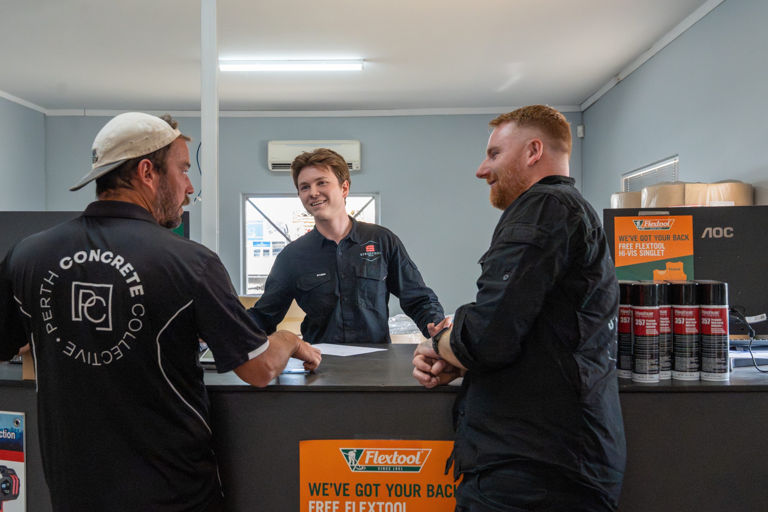 Customer requesting information about us at the sales desk